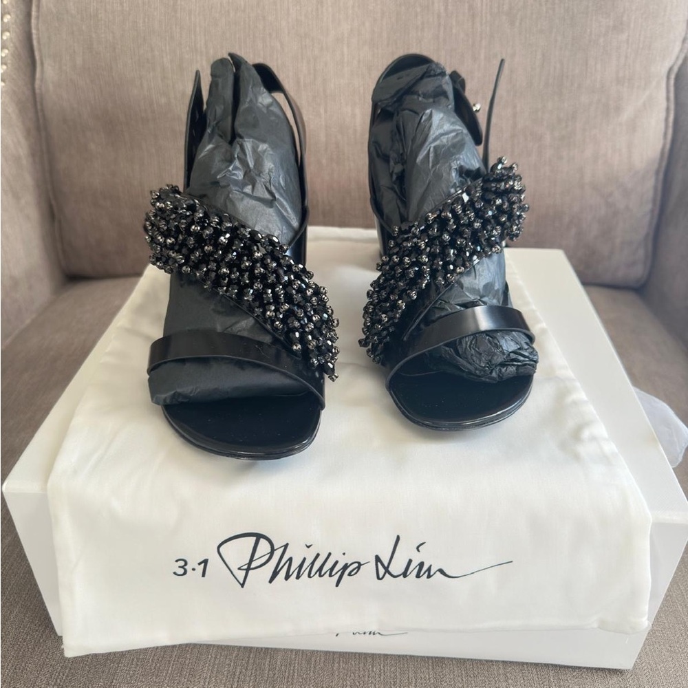 Brand new Phillip Lim black heels size 39! Beautiful black heels with beads.